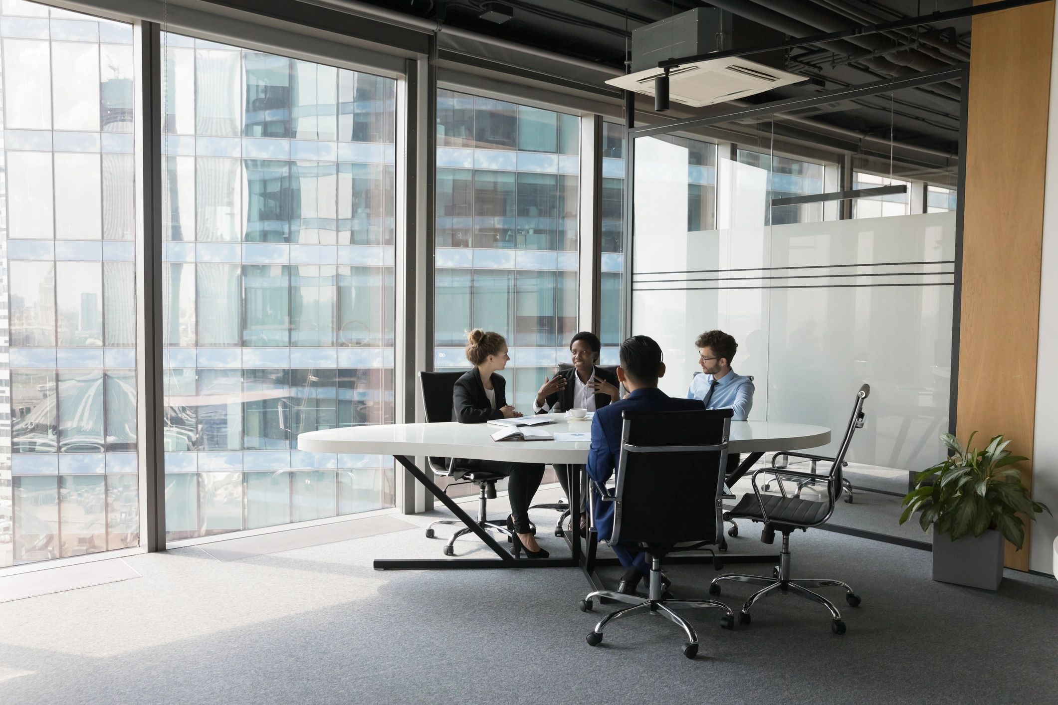 Business team discussing strategy in a meeting room